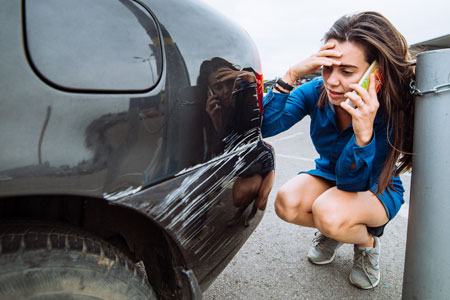 schade aan geleende auto
